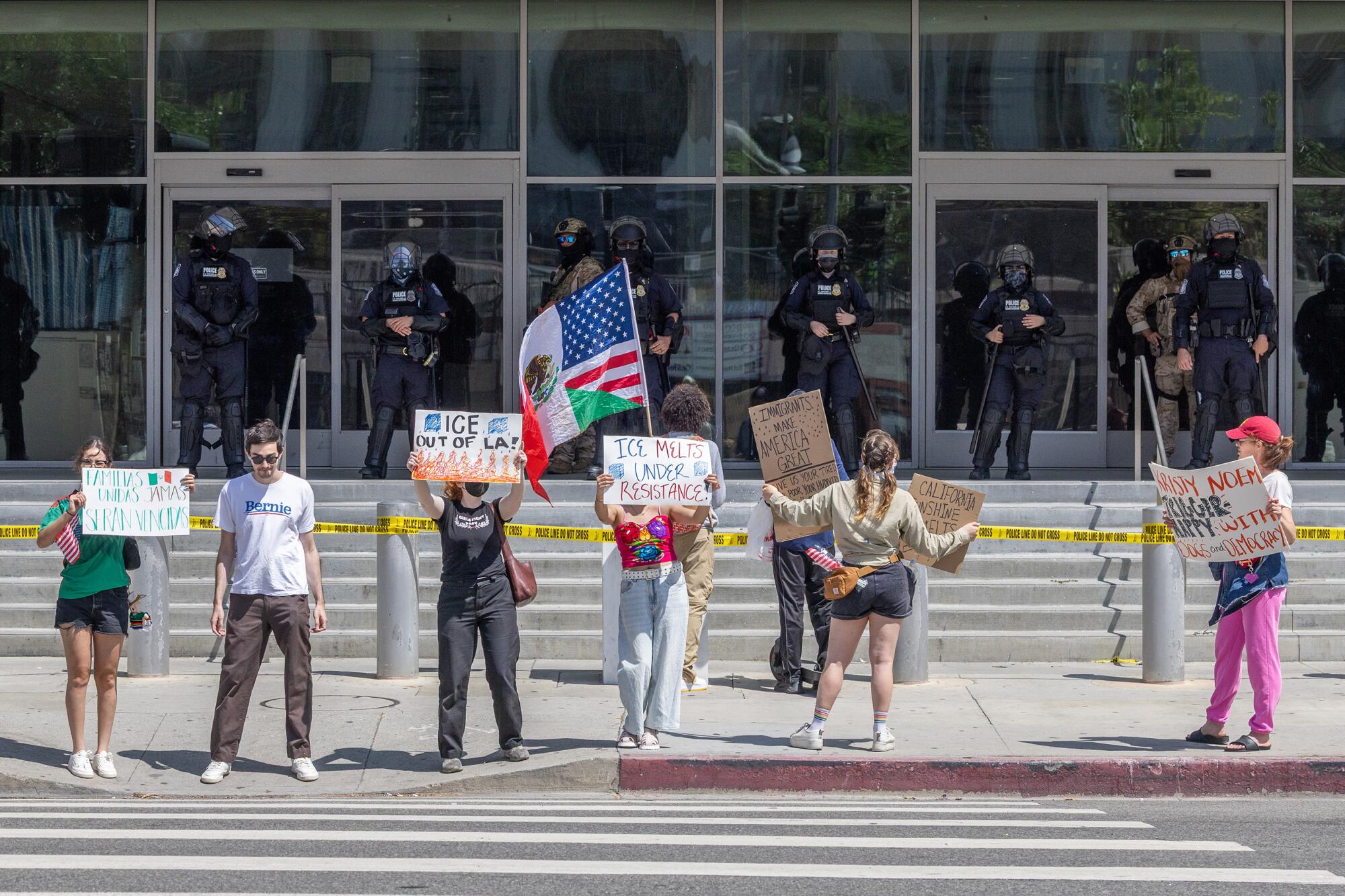 LOS ANGELES, CA - JUNE 13: A small group denounces ICE actions during a protest at