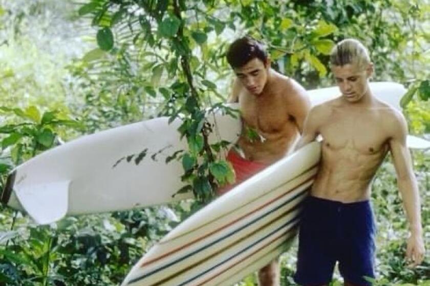 La Jolla surfer Mike Hynson (right) is pictured with Robert August in the film 'Endless Summer'.