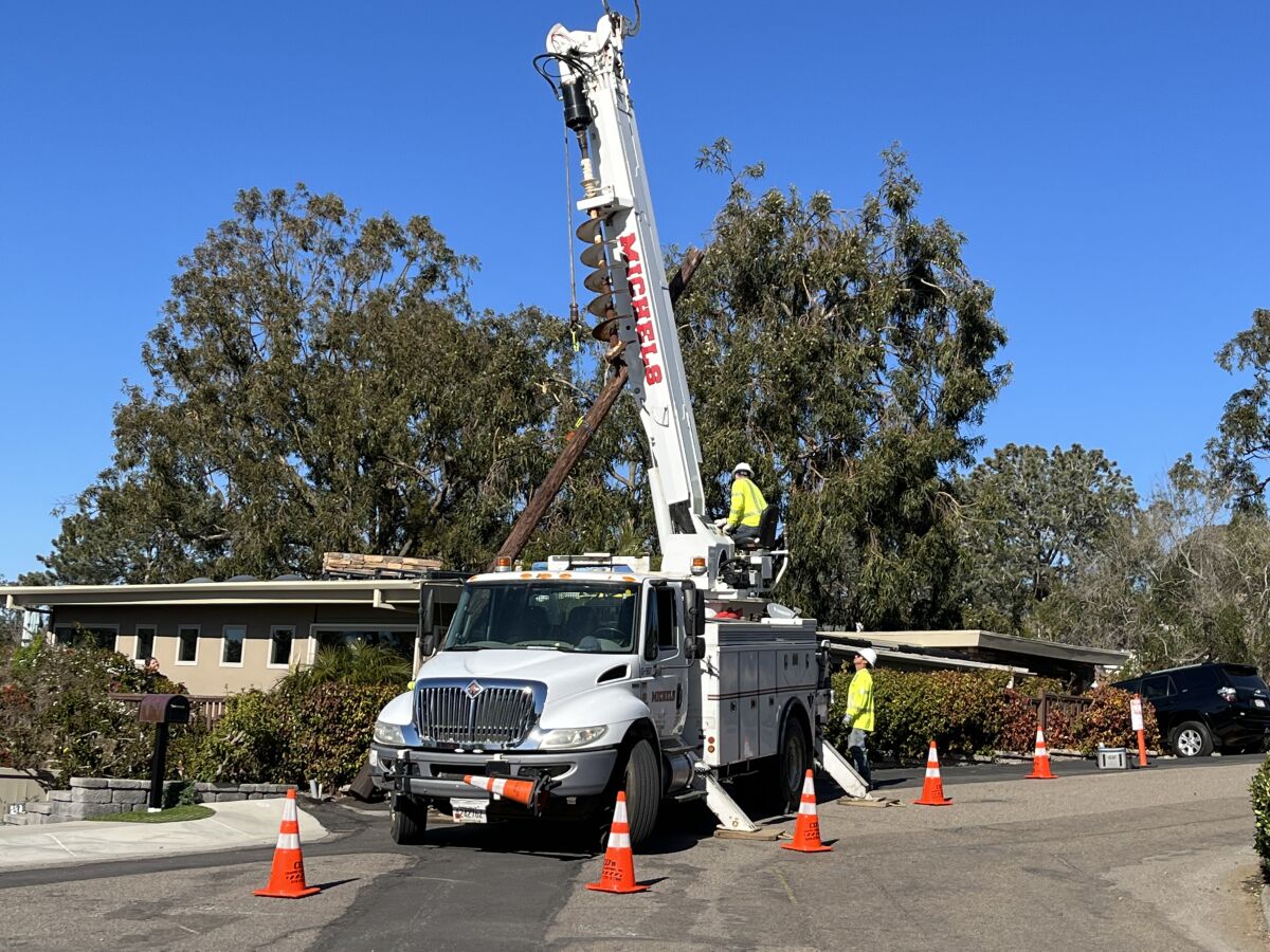 The 10th and final pole in the Tewa project was removed Feb. 8 during a brief ceremony.