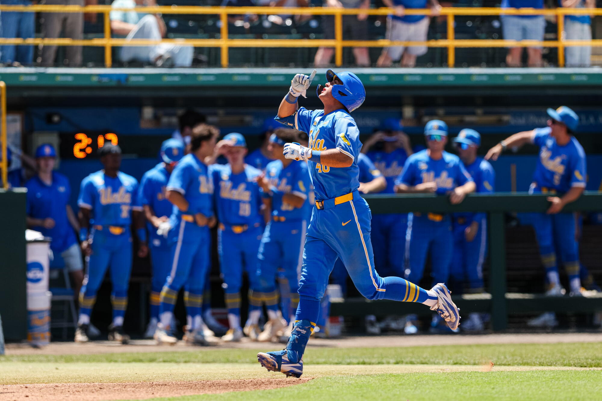 UCLA's Cashel Dugger celebrates after hitting a solo home run in the fourth inning of the Bruins' 6-5 win.