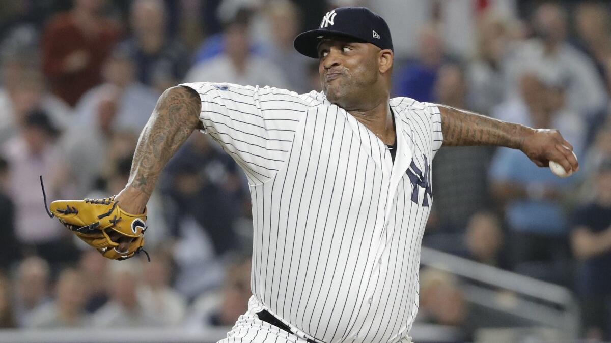 New York Yankees' CC Sabathia pitches against the Boston Red Sox during Game 4 of the teams' American League Division Series on Oct. 9.