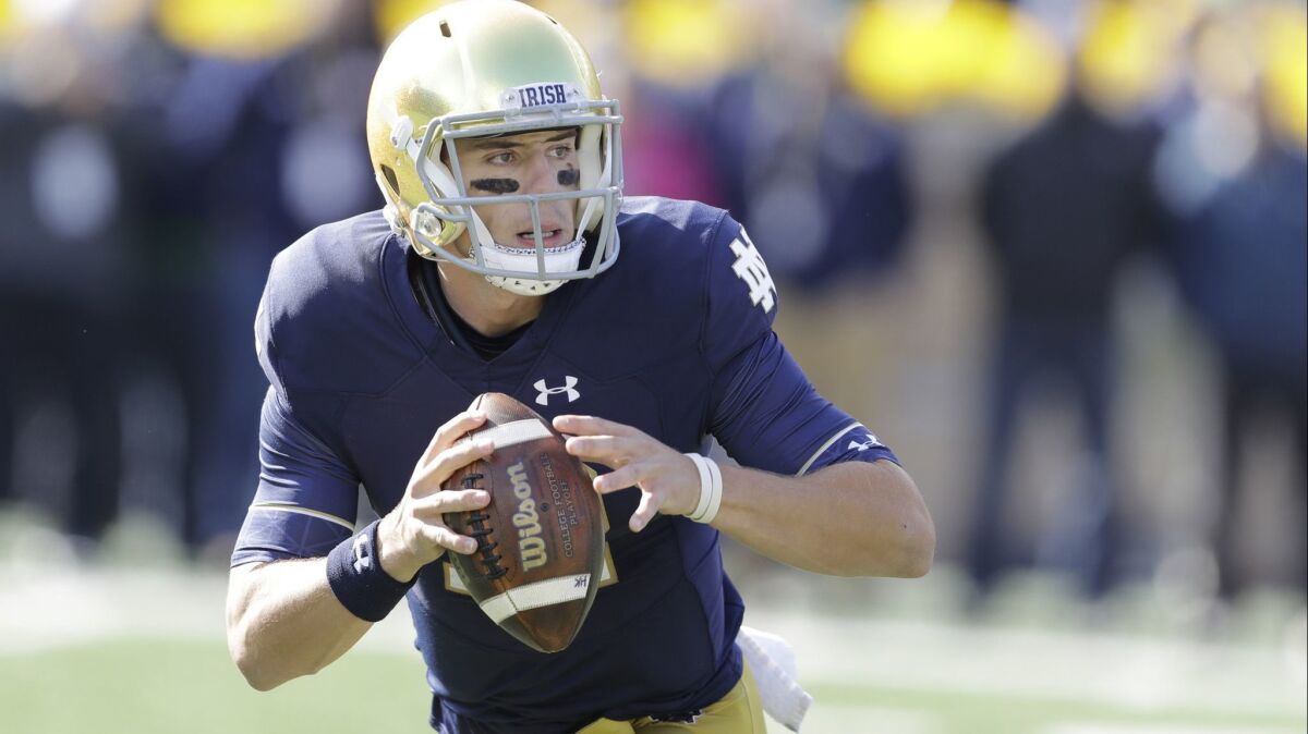 Notre Dame quarterback Ian Book prepares to throw during the first half against Pittsburgh on Oct. 13.