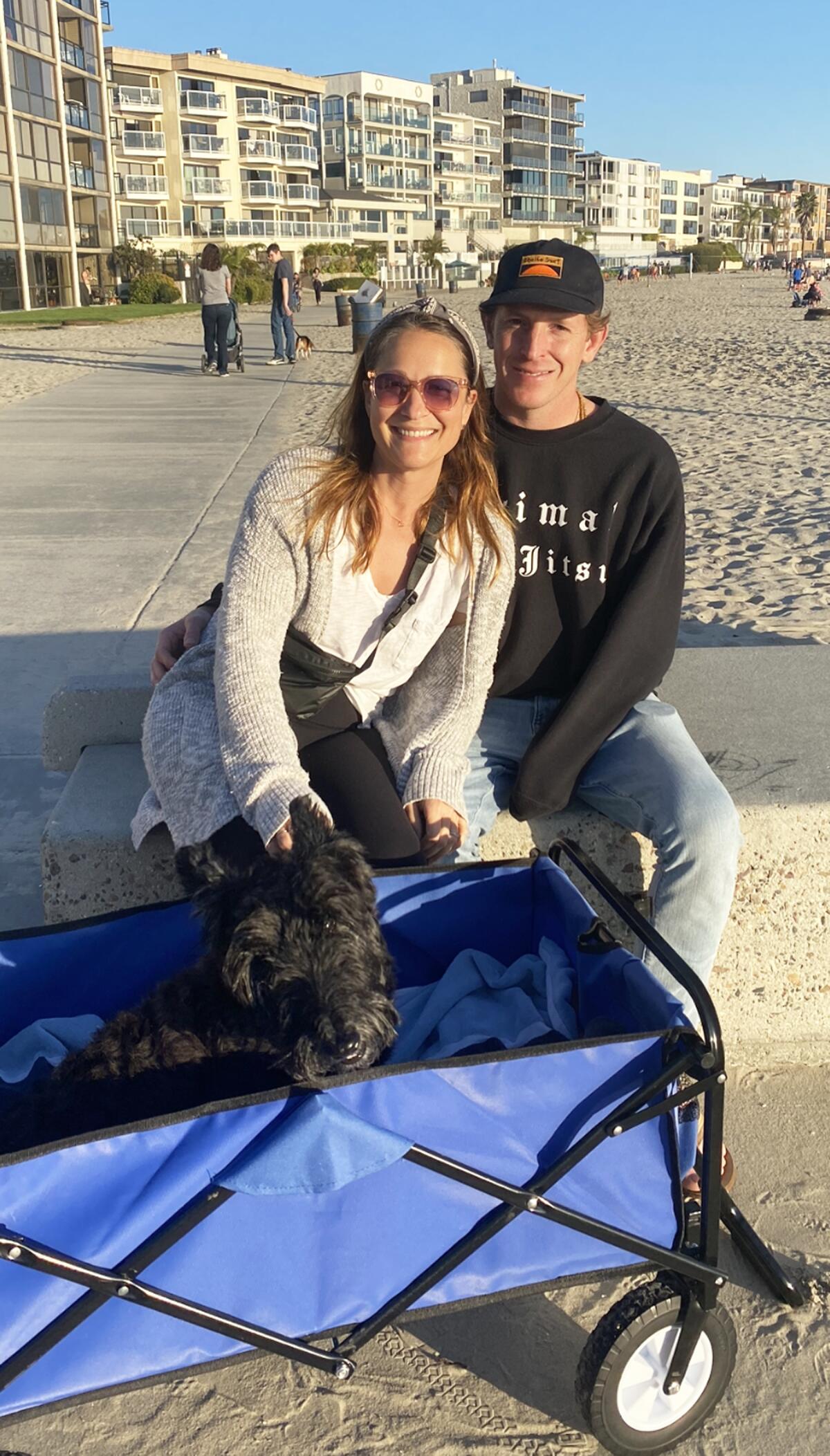 Leah and Craig Straub with their dog, Yogi. The couple has lived in Pacific Beach for 21 and 18 years, respectively.
