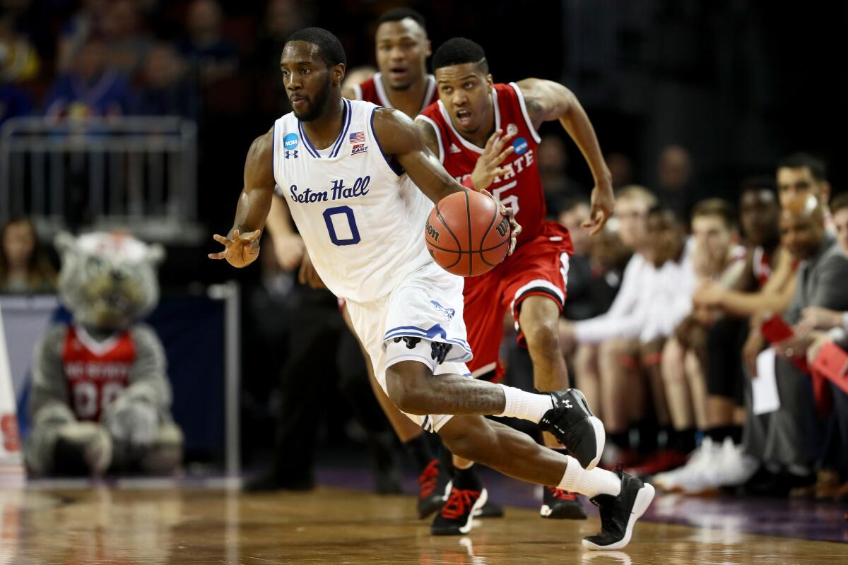 Seton Hall's Khadeen Carrington dribbles the ball in the second half against NC State.