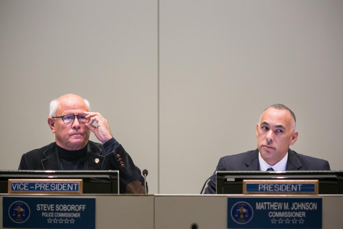 Police Commissioner Steve Soboroff, left, and Matthew Johnson, the panel's president at Tuesday's L.A. Police Commission meeting.