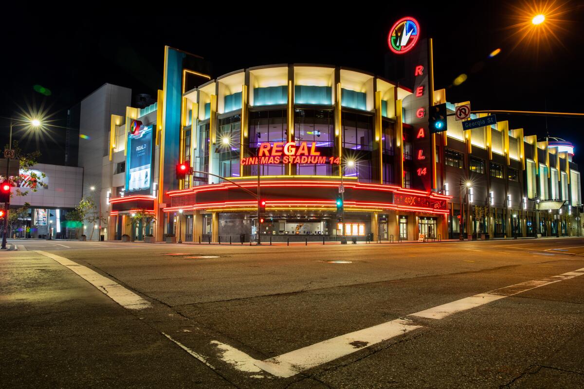 The Regal theater at LA Live is lit up and empty on March 21.