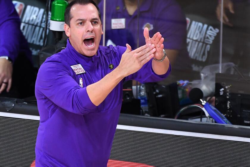 ORLANDO, FLORIDA SEPTEMBER 30, 2020-Lakers ead coacdh Frank Vogel calls a timeout against the Heat in Game 1 of the NBA FInals in Orlando Wednesday. (Wally Skalij/Los Angeles Times)