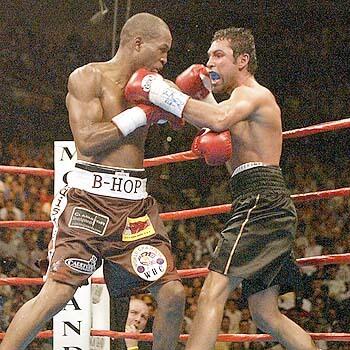Bernard Hopkins and Oscar De LA Hoya go toe to toe in the ninth round of their title bout at the MGM Grand in Las Vegas.