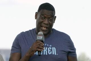 Former NBA star Shawn Kemp speaks during the Seattle Kraken's NHL hockey expansion draft event in Seattle, July 21, 2021. 