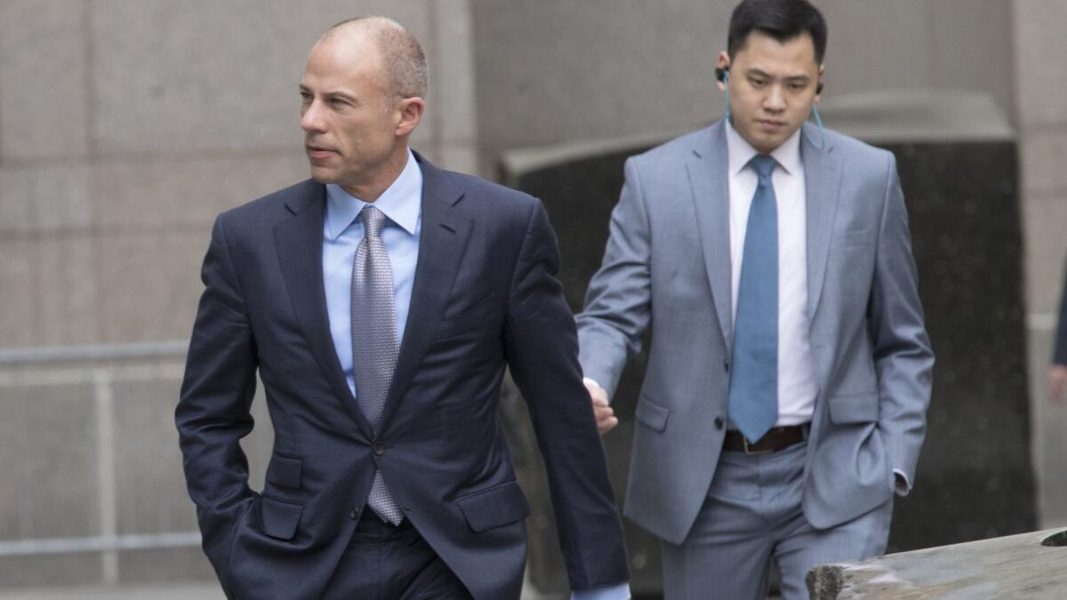 Michael Avenatti, left, attorney and spokesperson for adult film actress Stormy Daniels, arrives at federal court in Manhattan on Friday.