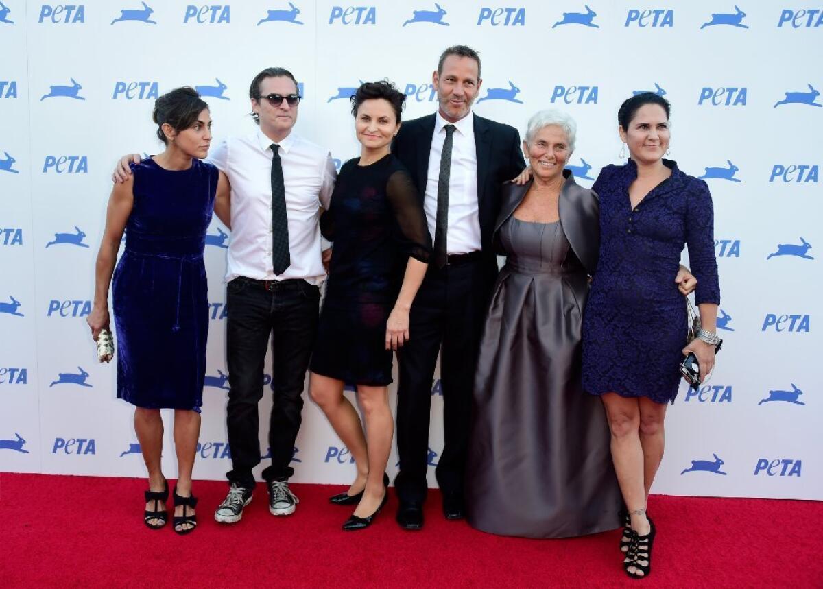 It's a Phoenix fest on the red carpet for PETA's 35th Anniversary Party with, from left, Summer Phoenix, Joaquin Phoenix, Rain Phoenix, Jeffrey Weisberg, Arlyn Phoenix and Liberty Phoenix.