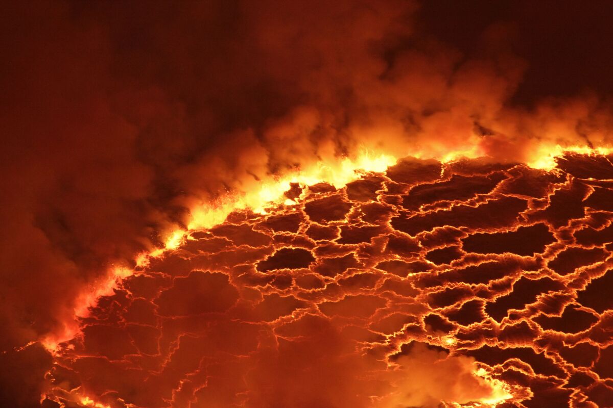 Magma churns in the lava lake of Mount Nyiragongo outside Goma, Congo. If the entire Earth did not melt during a collision 4.5 billion years ago, that means there may be a few hidden vestiges of our planet from a time before the moon.