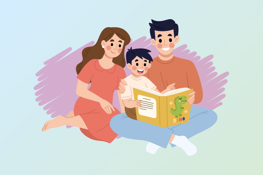 Parents reading to a child.