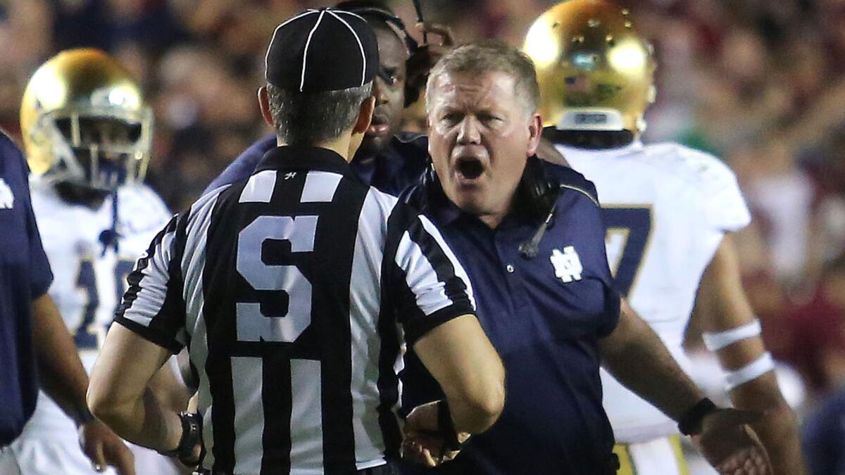 Notre Dame Coach Brian Kelly shouts at an official after an apparent winning touchdown catch was called back due to offensive pass interference in the closing seconds of a 31-27 loss to Florida State on Saturday.