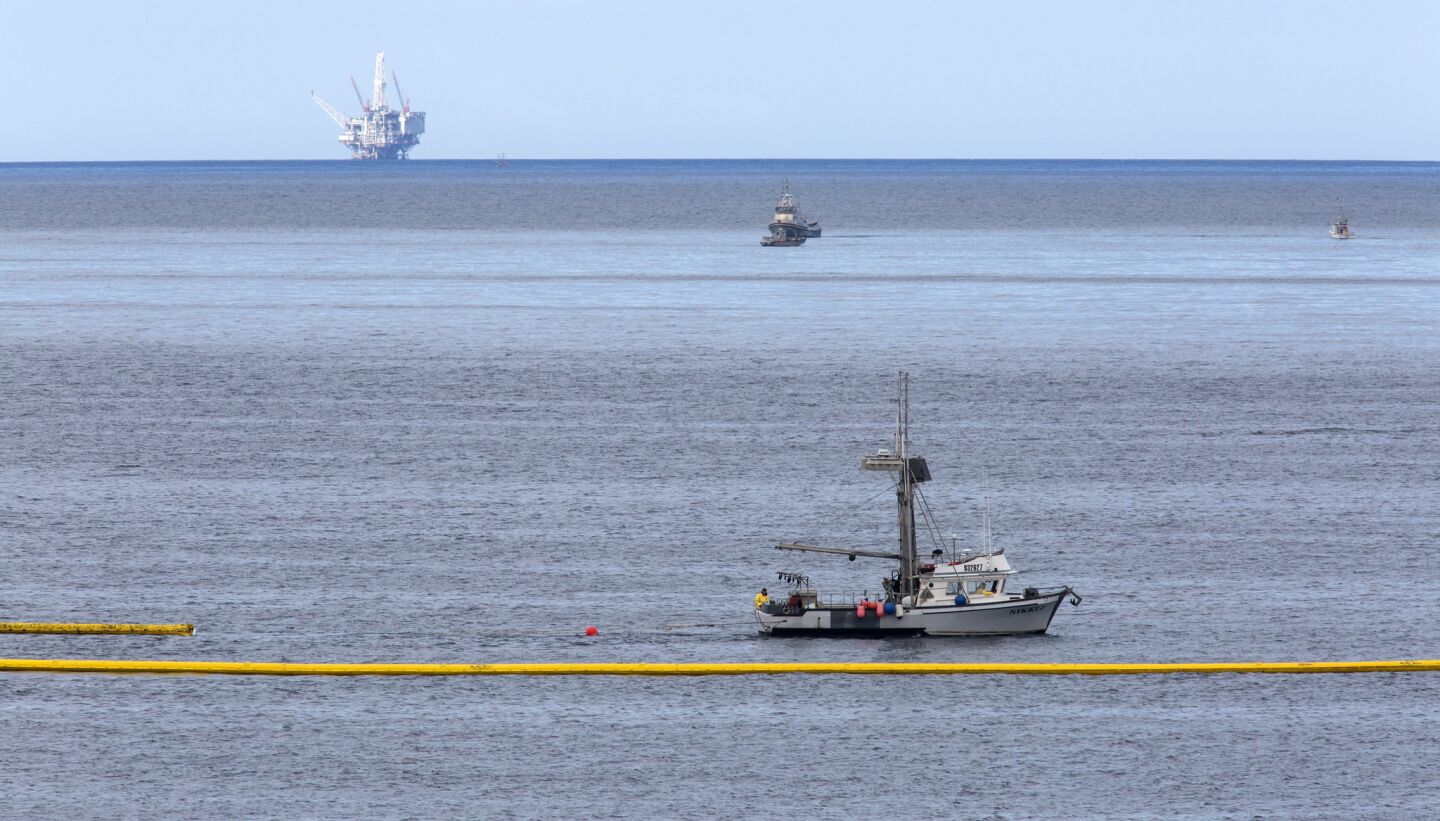 Oil recovery and cleanup vessels ply the waters off El Capitan State Beach near Santa Barbara.