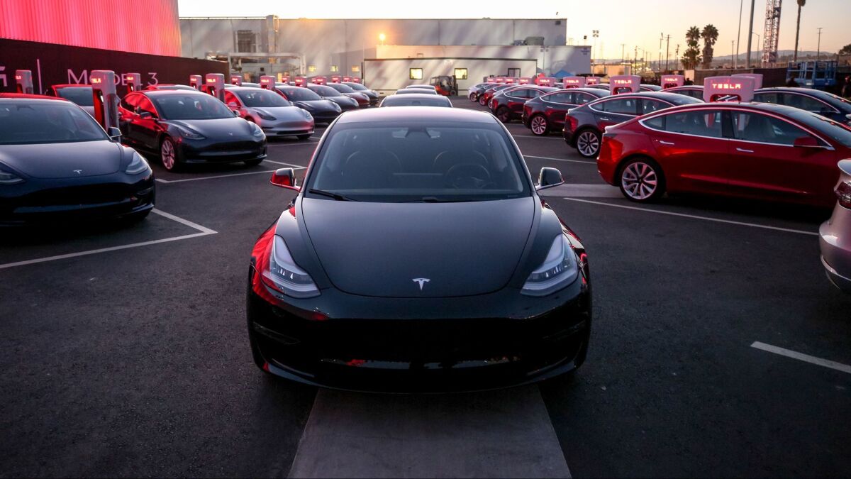 The $35,000 base price of Tesla's Model 3 car could drop by more than $16,000 if a more aggressive state rebate program proposed by a San Francisco assemblyman is adopted. (Tesla)