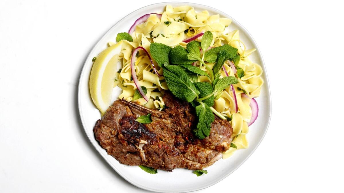 Marinated lamb shoulder chops with minty egg noodles and pickled red onions.