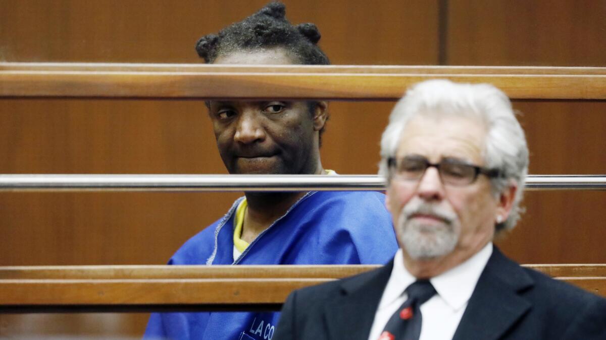 Terry Bryant is with attorney Daniel Brookman in a Los Angeles courtroom last March during his arraignment on a charge of stealing Frances McDormand's Oscar.