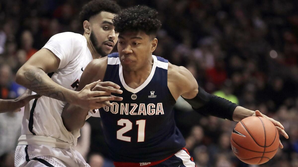 Gonzaga's Rui Hachimura drives against Pacific's Jeremiah Bailey on Feb. 28 in Stockton.