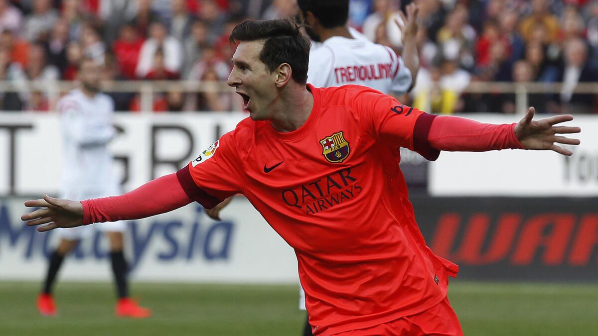 Barcelona's Lionel Messi celebrates April 11 after scoring against Sevilla in a La Liga match.