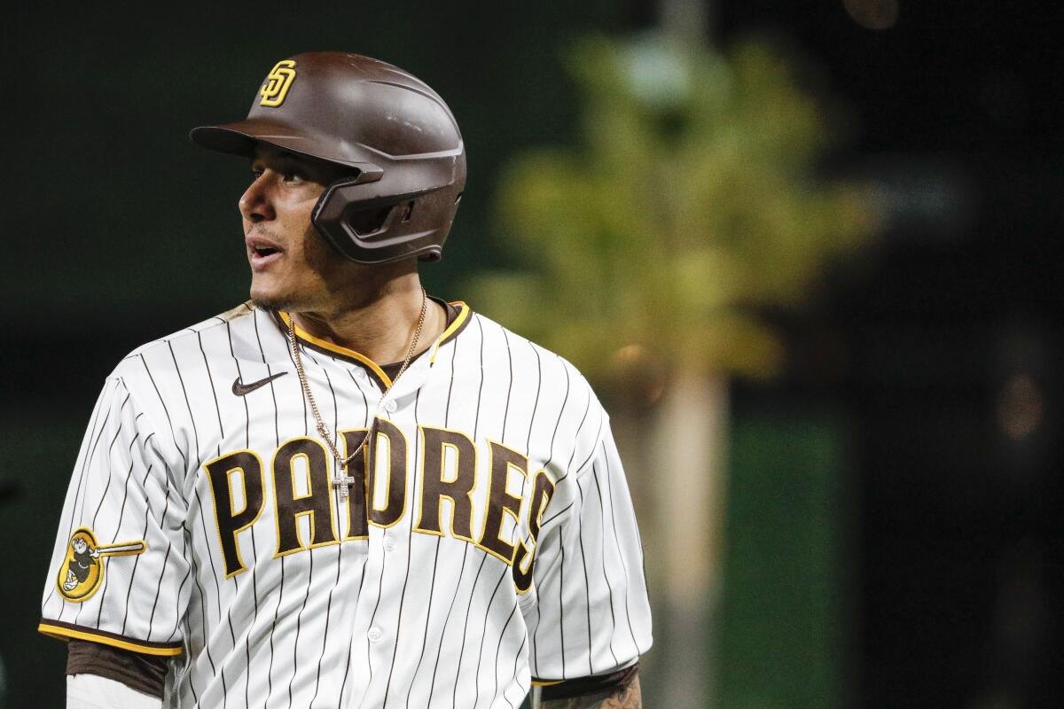 Manny Machado of the San Diego Padres takes the field in the first