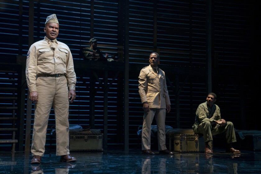 This image released by Polk & Co. shows David Alan Grier, from left, Blair Underwood, and Billy Eugene Jones during a performance of "A Soldier's Play" in New York. Costume designer Dede Ayite has earned two 2021 Tony Award nominations for costume design, one for "Slave Play" and another for “A Soldier's Story.” (Joan Marcus/Polk & Co. via AP)