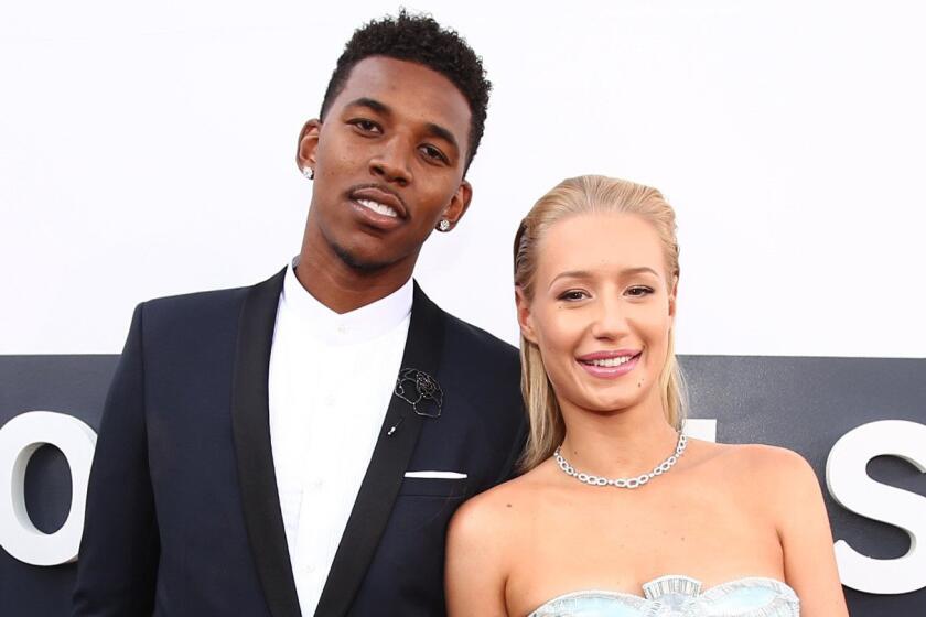 Nick Young and Iggy Azalea attend the MTV Music Awards at the Forum on Aug. 24, 2014.