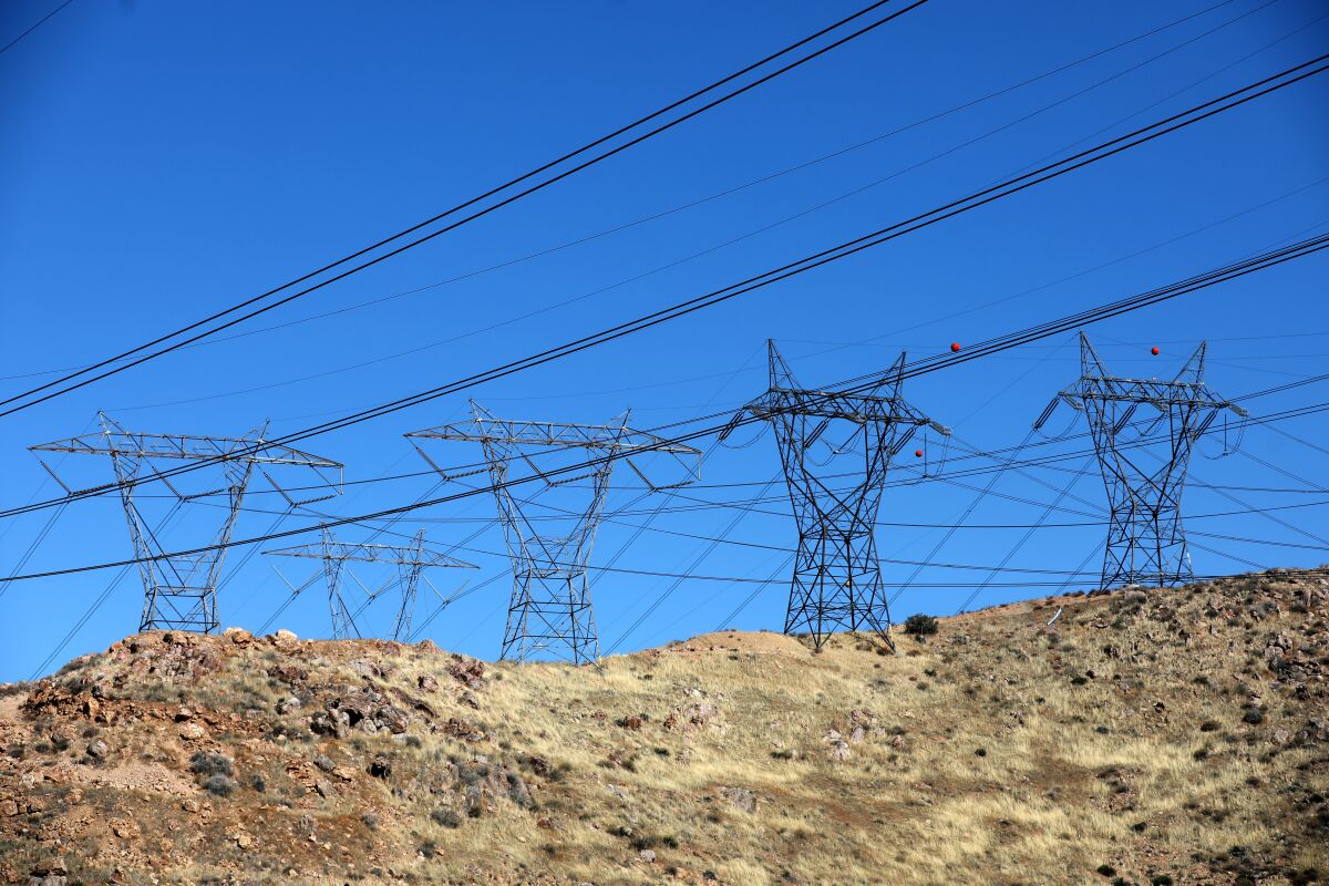 PALMDALE, CA - FEBRUARY 04: Path 26 electric transmission lines along a power corridor connecting to Southern California Edison's Vincent Substation on Thursday, Feb. 4, 2021 in Palmdale, CA. (Gary Coronado / Los Angeles Times)