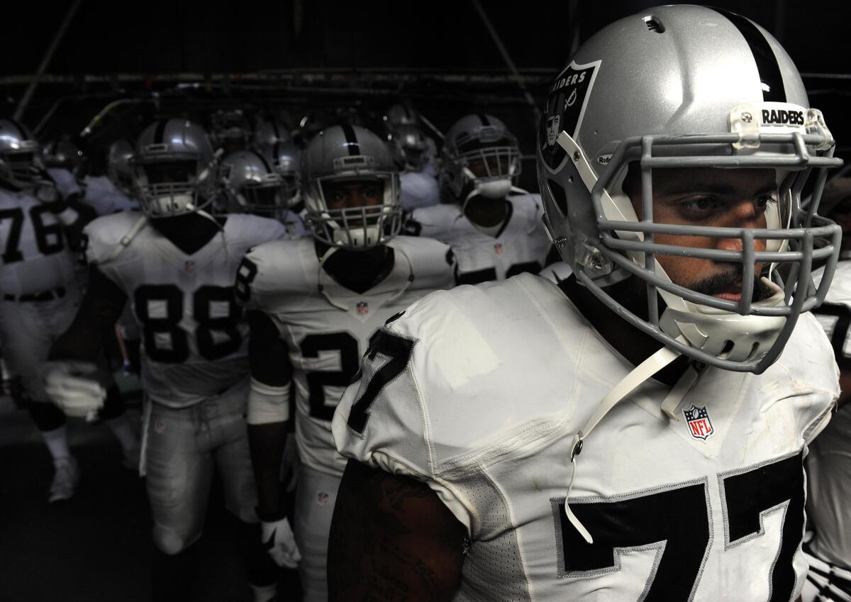 Oakland Raiders tackle Austin Howard prepares to take the field with his teammates before a game against the San Diego Chargers on Oct. 25.