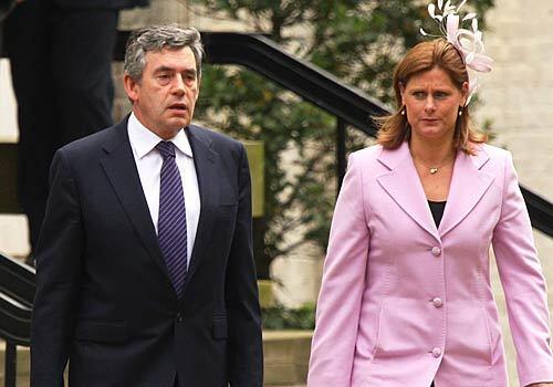 British Prime Minister Gordon Brown and his wife, Sarah, leave the memorial for Princess Diana.