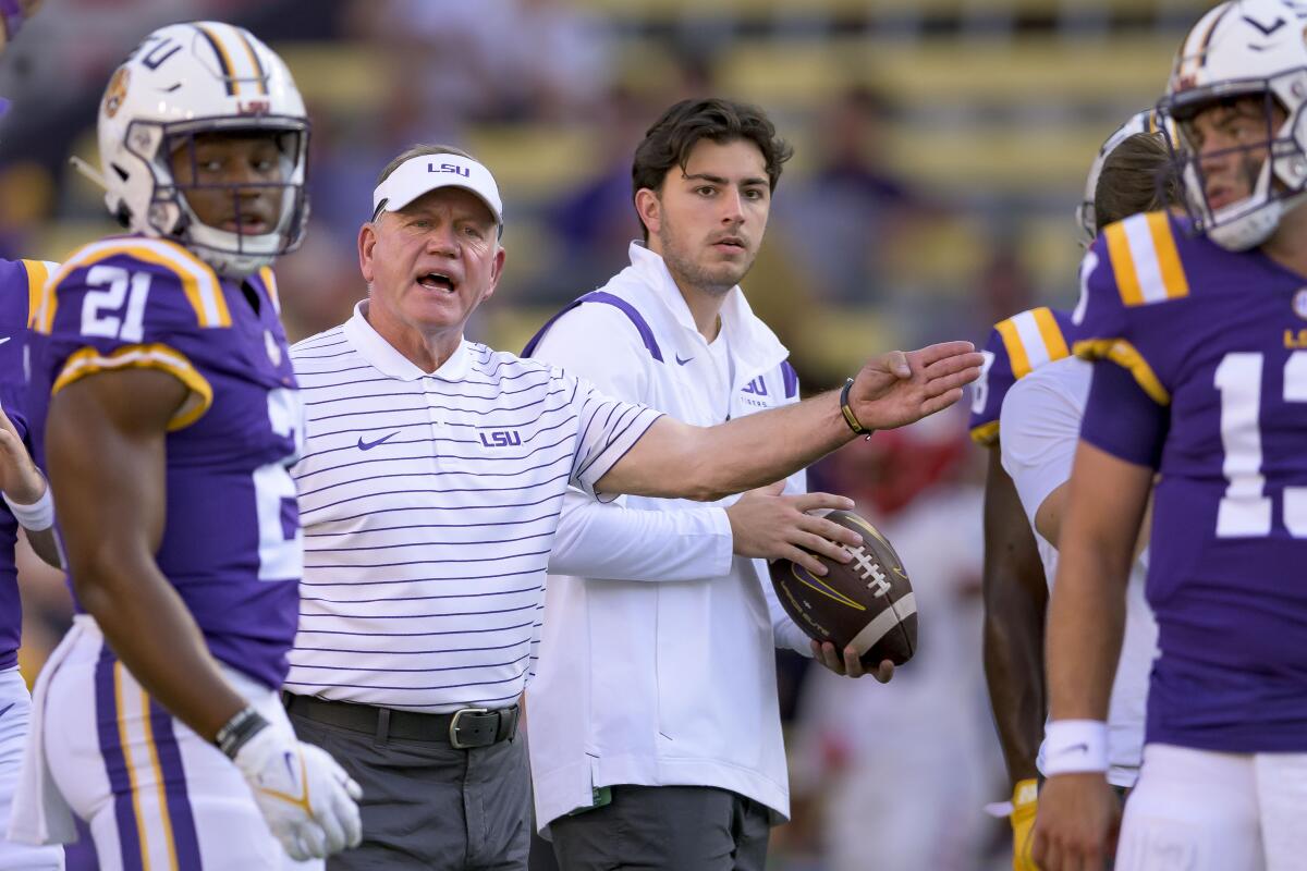 LSU coach Brian Kelly directs players before they face New Mexico
