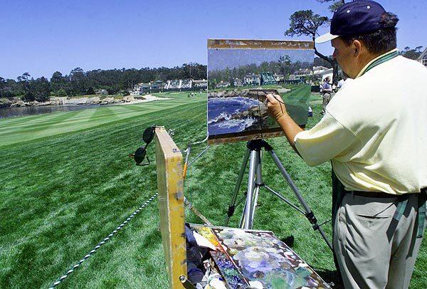 Thomas Kinkade paints the famous 18th hole at Pebble Beach, Calif., during the last day of practice for the 100th U.S. Open in 2000.