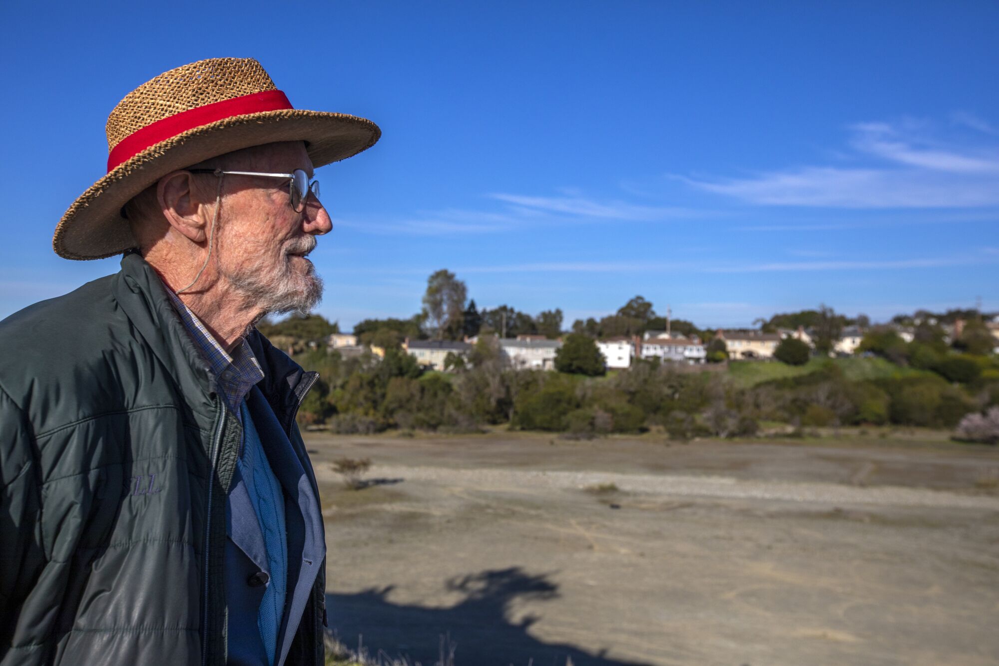 Sherman Lewis looks out over a former quarry in Hayward. 