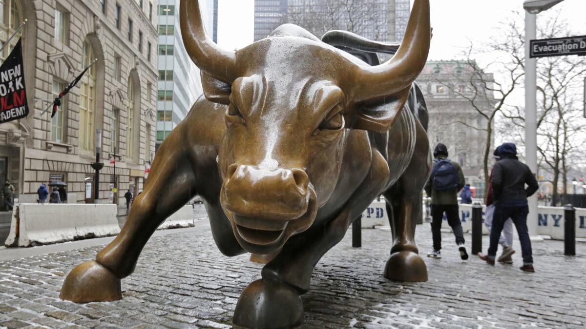 The "Charging Bull" sculpture by Arturo Di Modica stands in New York's Financial District.