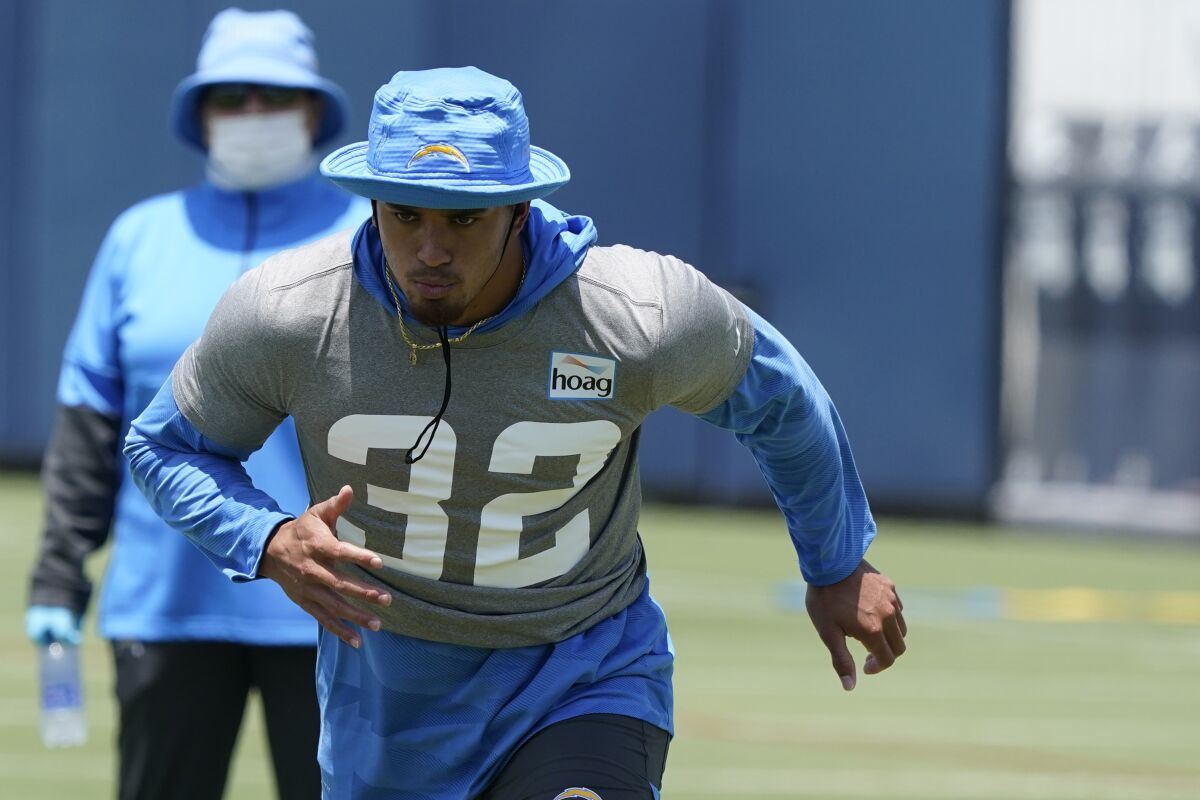 Chargers safety Alohi Gilman runs during camp.