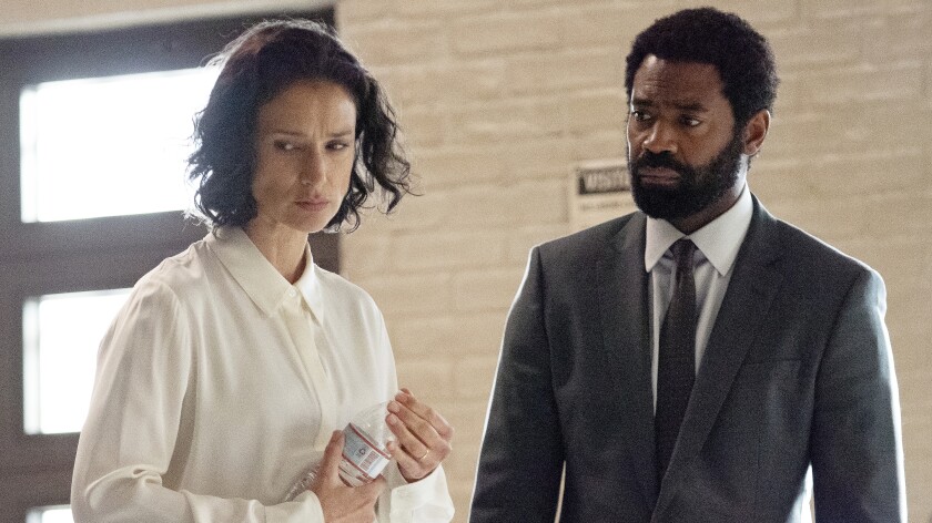Indira Varma and Nicholas Pinnock in "For Life" on ABC.
