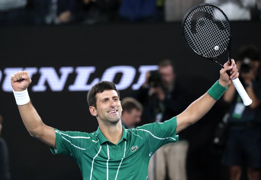 Novak Djokovic celebrates after defeating Dominic Thiem in the men's singles final of the Australian Open in Melbourne, Australia on Sunday.