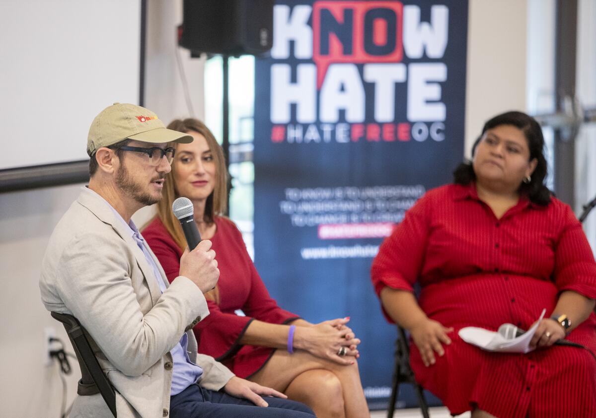 Gideon Berstein and Jeanne Pepper Bernstein, the parents of the late Blaze Bernstein, speak during the OC Human Relations Council's annual hate crime report release event at the Los Olivos Community Center in Irvine on Sept. 26.