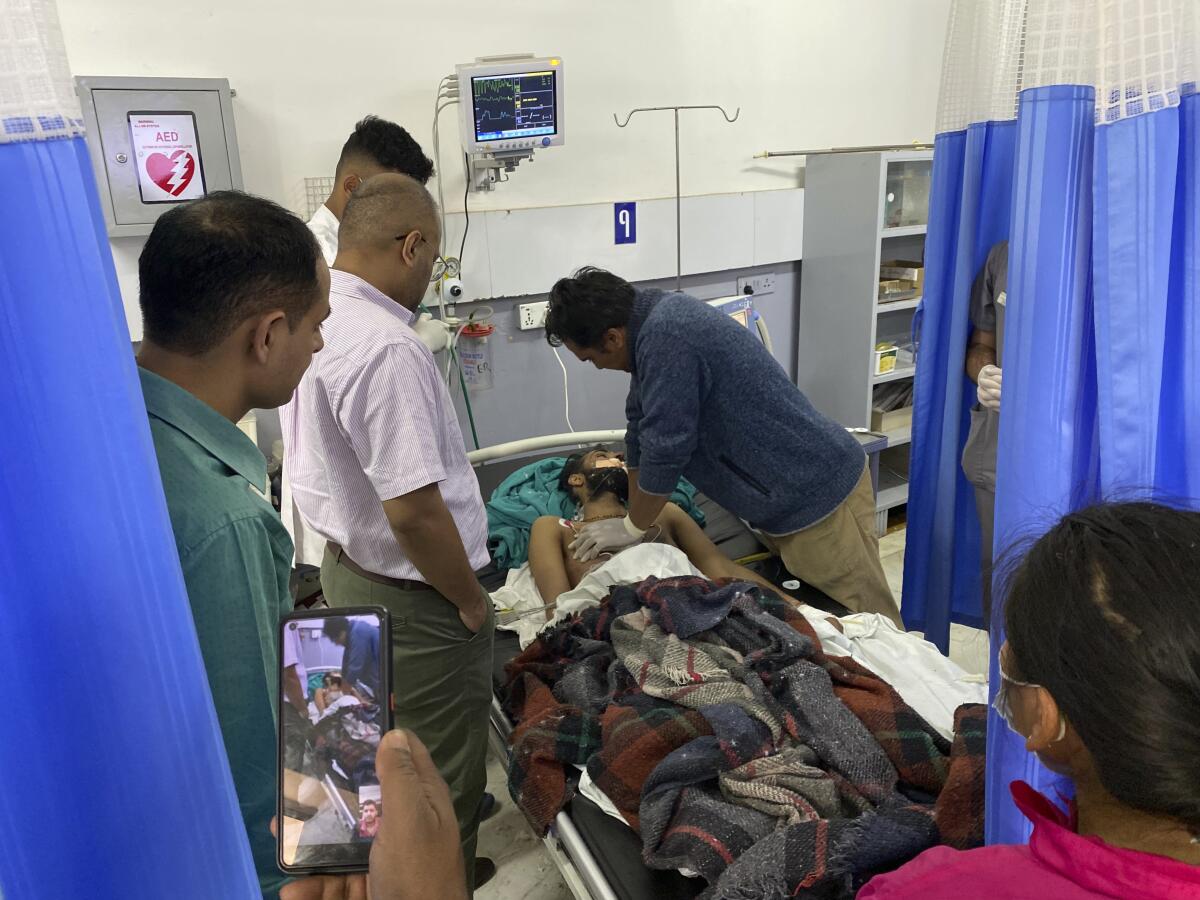 Injured Indian climber receiving treatment at a hospital in Nepal