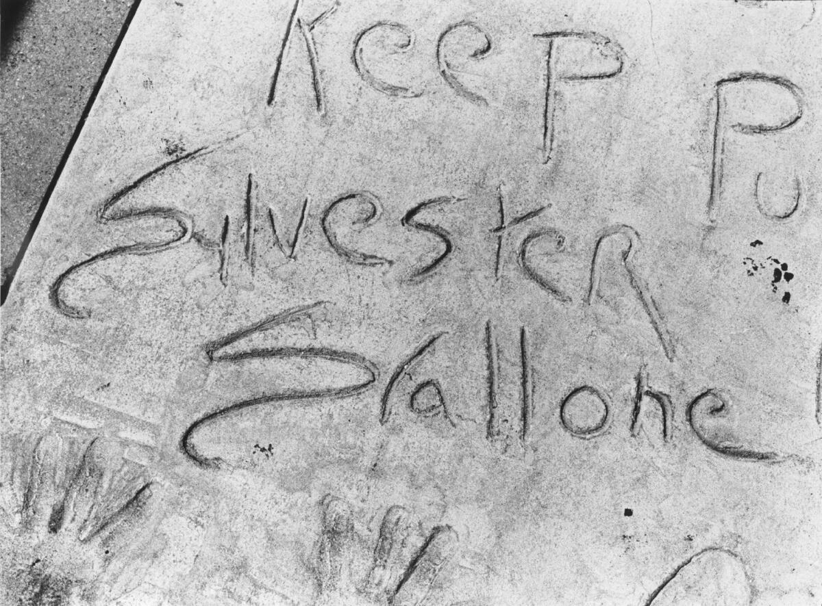 Sylvester Stallone's misspelled named etched in wet concrete in front of Mann's Chinese Theater. (Los Angeles Times file photo)