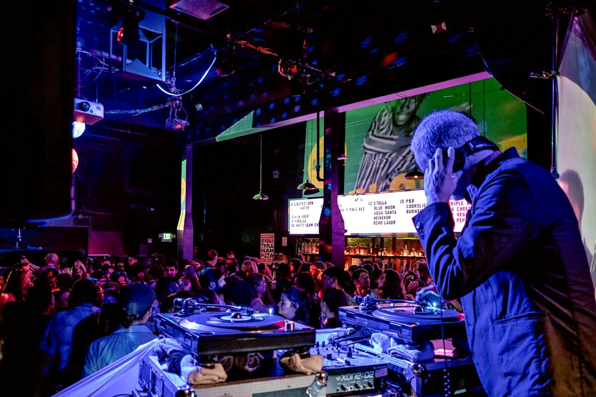 DJ Miles Tackett spins for a packed crowd at Funky Sole club night at the Echo in an undated photo.