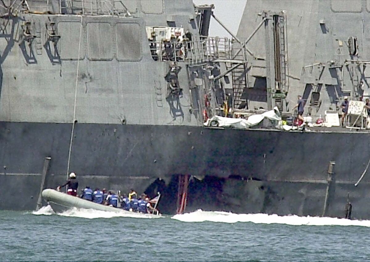The USS Cole after an attack ripped open a hole in its hull 