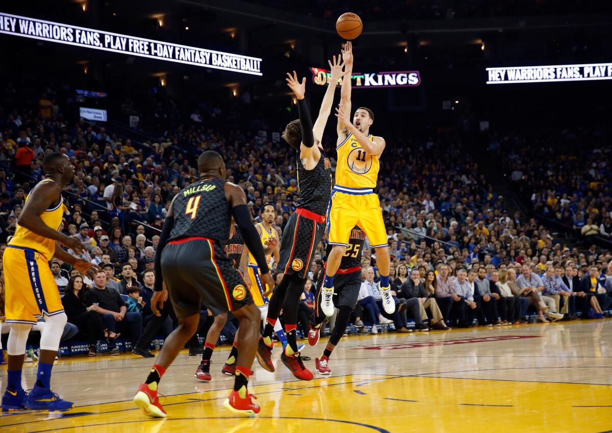 Warriors guard Klay Thompson had 26 points including six three-pointers in Golden State's overtime victory over Atlanta, 109-105.