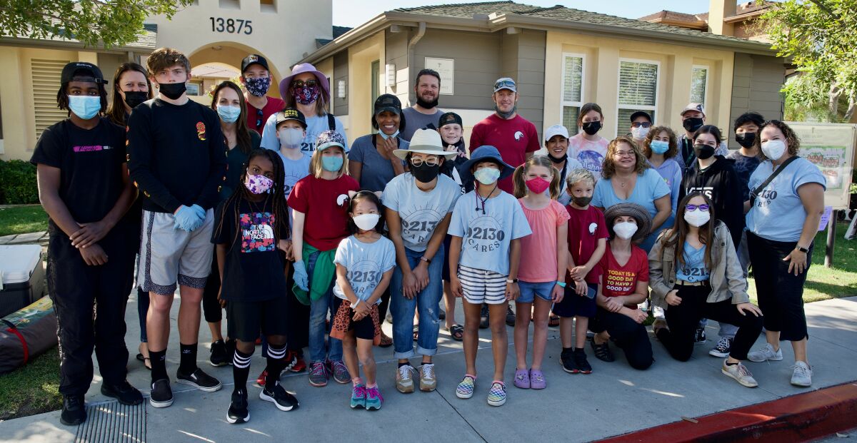 Several youth groups recently helped the nonprofit 92130Cares with a food distribution at the Torrey Del Mar apartments.