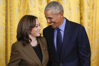 FILE - Former President Barack Obama talks with Vice President Kamala Harris during an event about the Affordable Care Act, in the East Room of the White House in Washington, April 5, 2022. Former President Barack Obama and former first lady Michelle Obama have endorsed Kamala Harris in her White House bid, giving the vice president the expected but still crucial backing of the nation’s two most popular Democrats. (AP Photo/Carolyn Kaster, File)