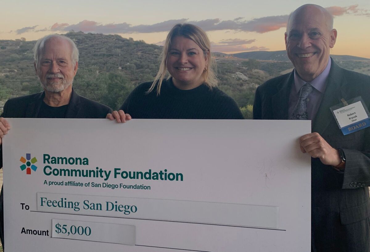 Feeding San Diego accepts a $5,000 check from Ramona Community Foundation. 