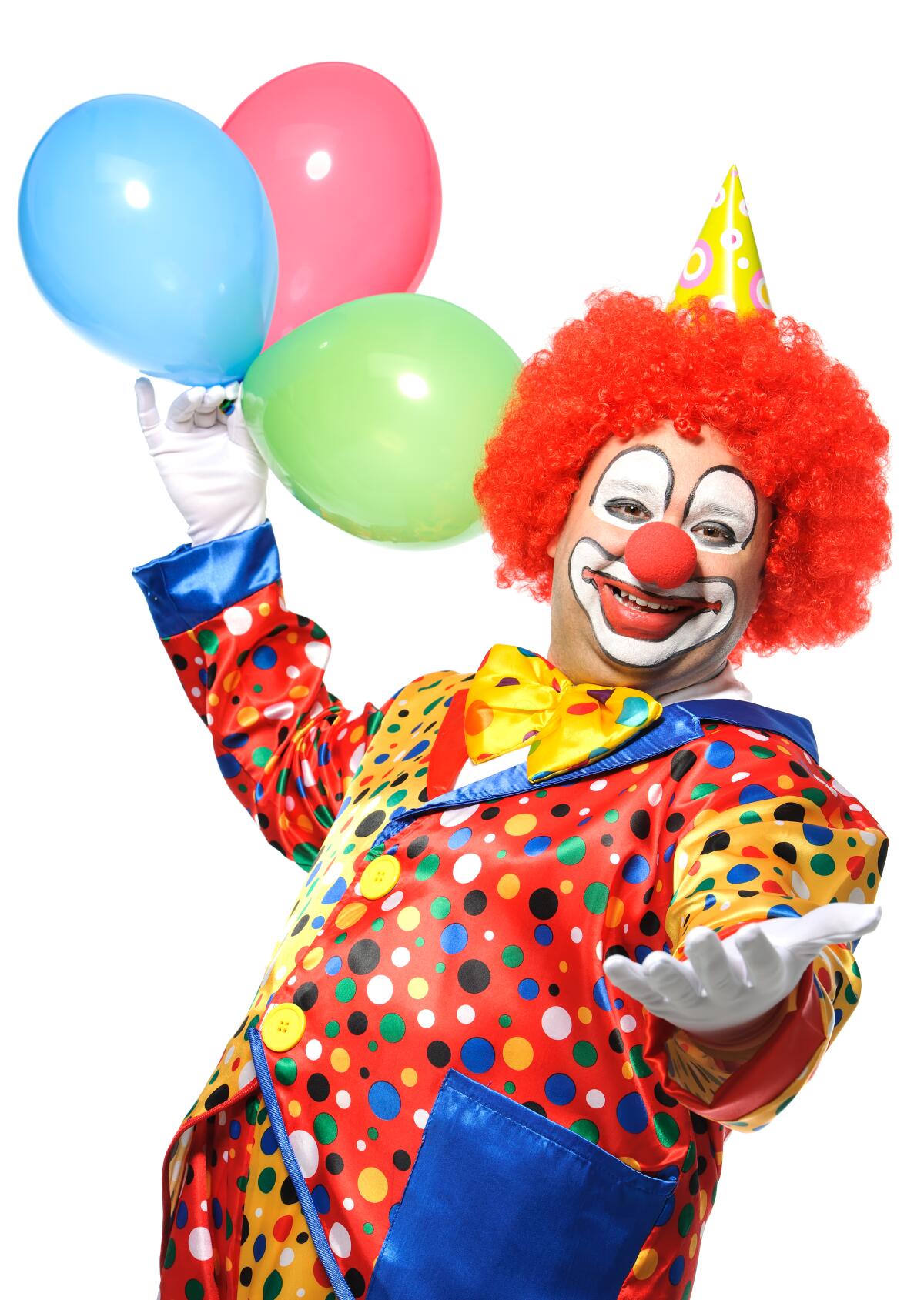 Portrait of a smiling clown with balloons isolated on white