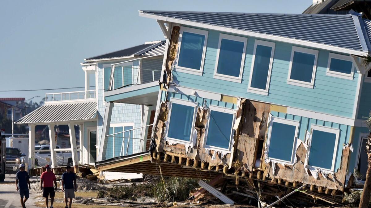 A building was knocked askew by Hurricane Michael in Mexico Beach, Fla. As of Sunday there was just one confirmed death in the town resulting from the storm.
