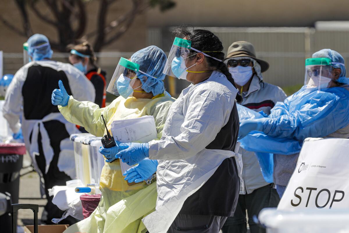 Coronavirus drive-through testing takes place in Victorville.