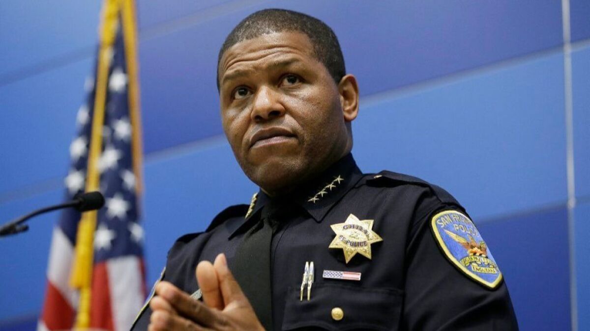 San Francisco Police Chief William Scott listens to questions during a news conference Tuesday in San Francisco.